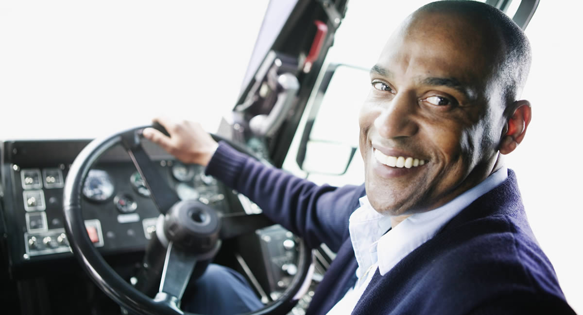 Photo of a happy bus driver