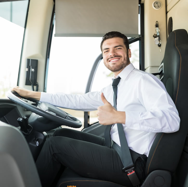 Photo of a happy driver giving thumbs up
